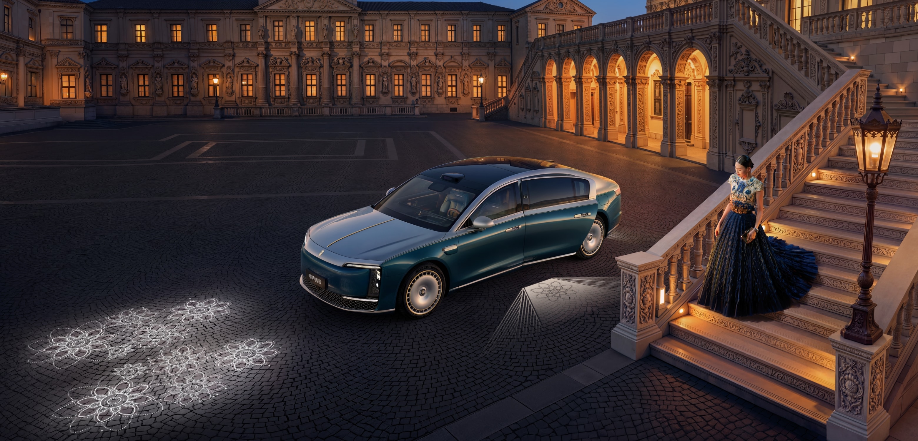 User approaches Maextro S800 Grand Design Signature Grand View, headlights and welcome lights illuminate
